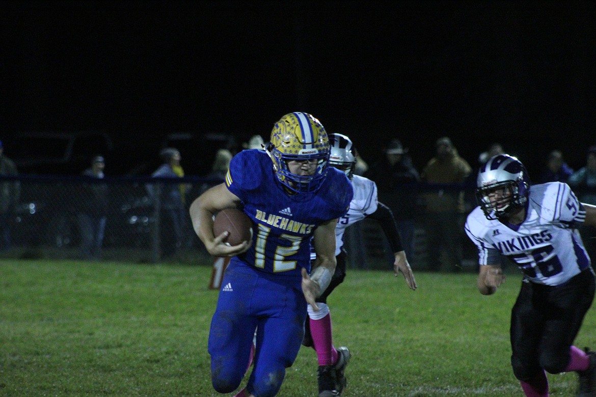 TREY FISHER running for a touchdown for the Bluehawks last Friday. (John Dowd/Clark Fork Valley Press)