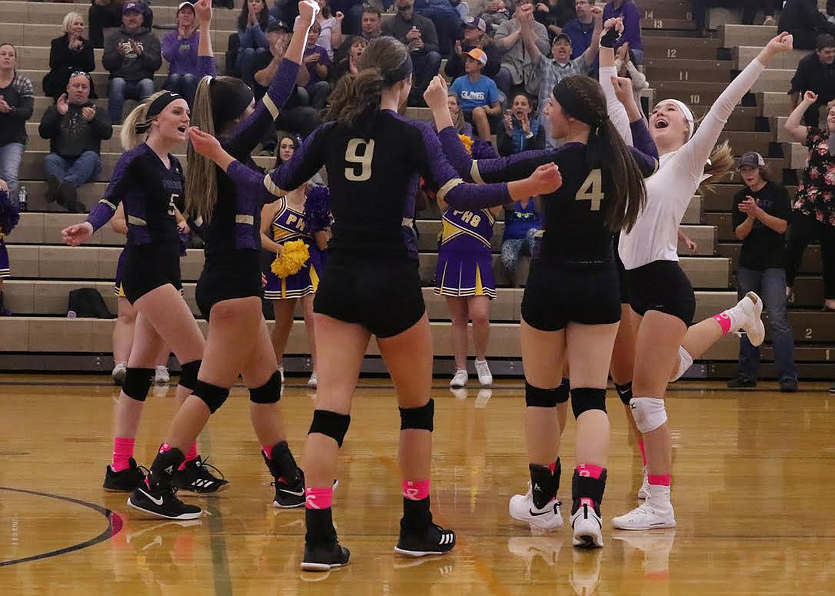 Polson Lady Pirates players celebrate their win over Browning Saturday. Polson improved to 12-8 overall and 7-1 in Northwest A. (Bob Gunderson)