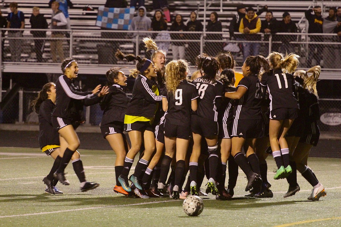 Casey McCarthy/Sun Tribune
Royal soccer players celebrate after defeating Wahluke in a penatly shootout last Thursday night at Royal High School.