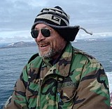 Dr. Jim Earl Lewis, 65