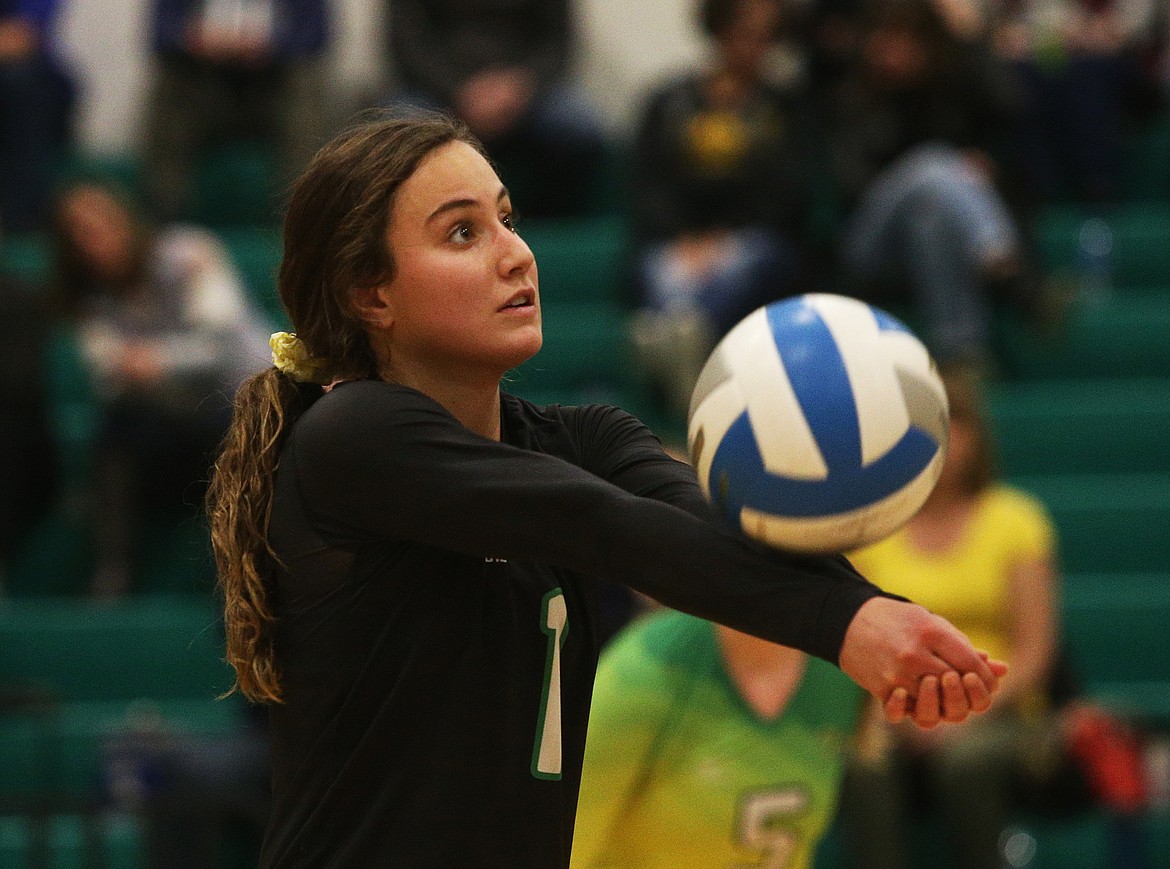 Lakeland High&#146;s Olivia Cooper passes a serve in a match against Moscow last Thursday in Rathdrum.