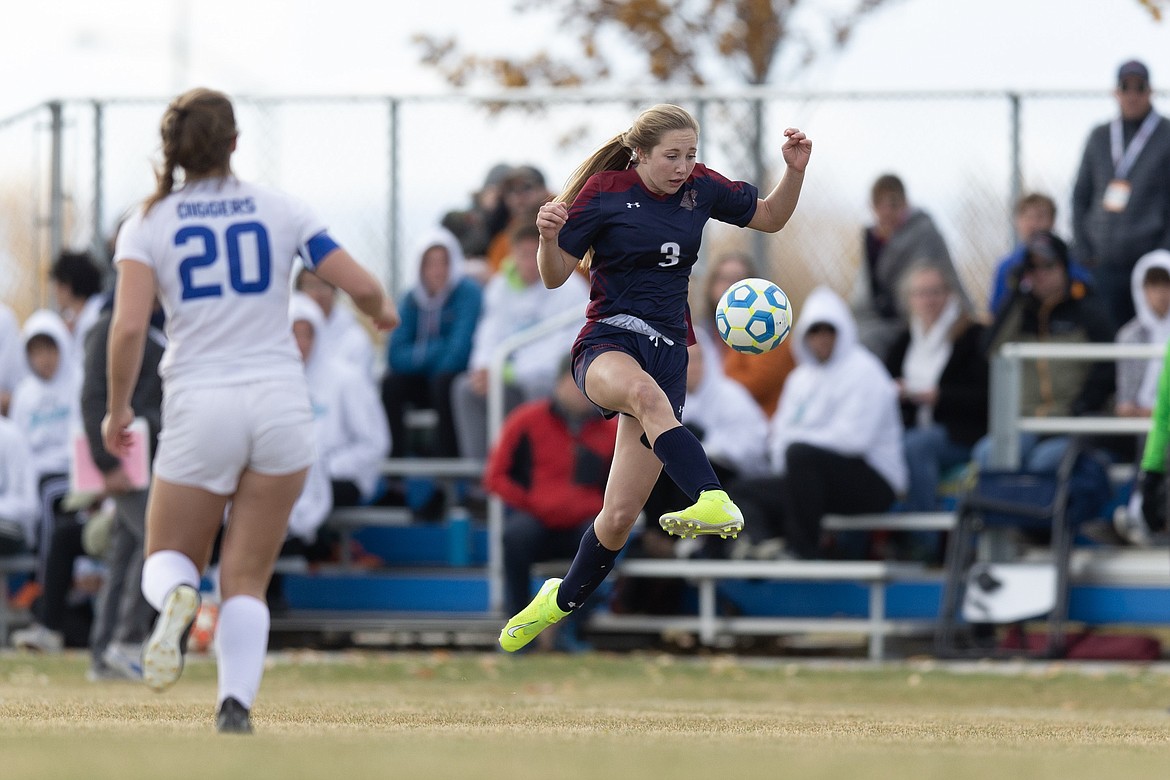 Photo by JASON DUCHOW PHOTOGRAPHY
Riley Jo Anderson (3) of Coeur d&#146;Alene Charter maneuvers the ball upfield as Sunny Bennion (20) of Sugar-Salem looks on.