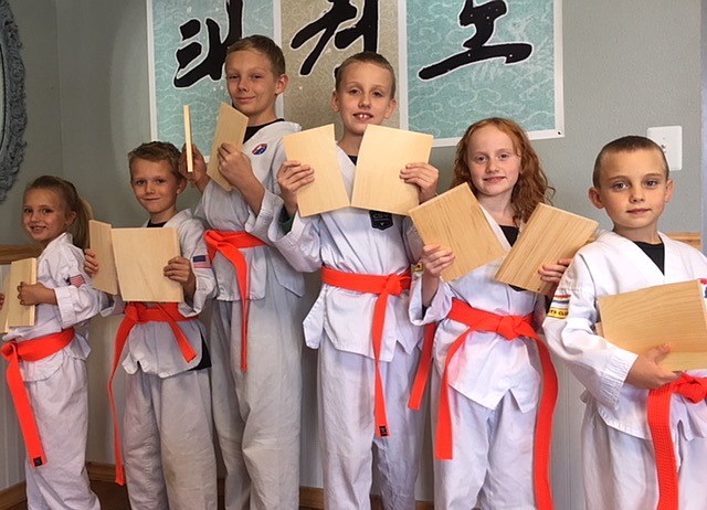 (Photo courtesy of SANDPOINT MARTIAL ARTS)
From left: Nina Tajan, Braden Burrows, Hunter Burrows, Brent Gronfur, Anna Gronfur and Bing Dawson all earned orange belts at a recent testing at Sandpoint Martial Arts.