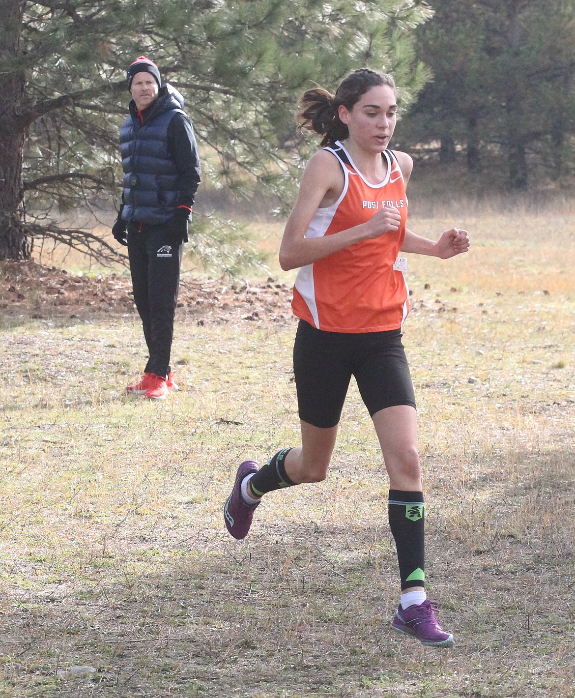 JASON ELLIOTT/Press
Post Falls senior Sydney Shanahan builds on her lead in the 5A Region 1 girls championship race, winning in 18 minutes, 22 seconds on Thursday at Farragut State Park. Post Falls won its third straight regional title after placing five in top 10.