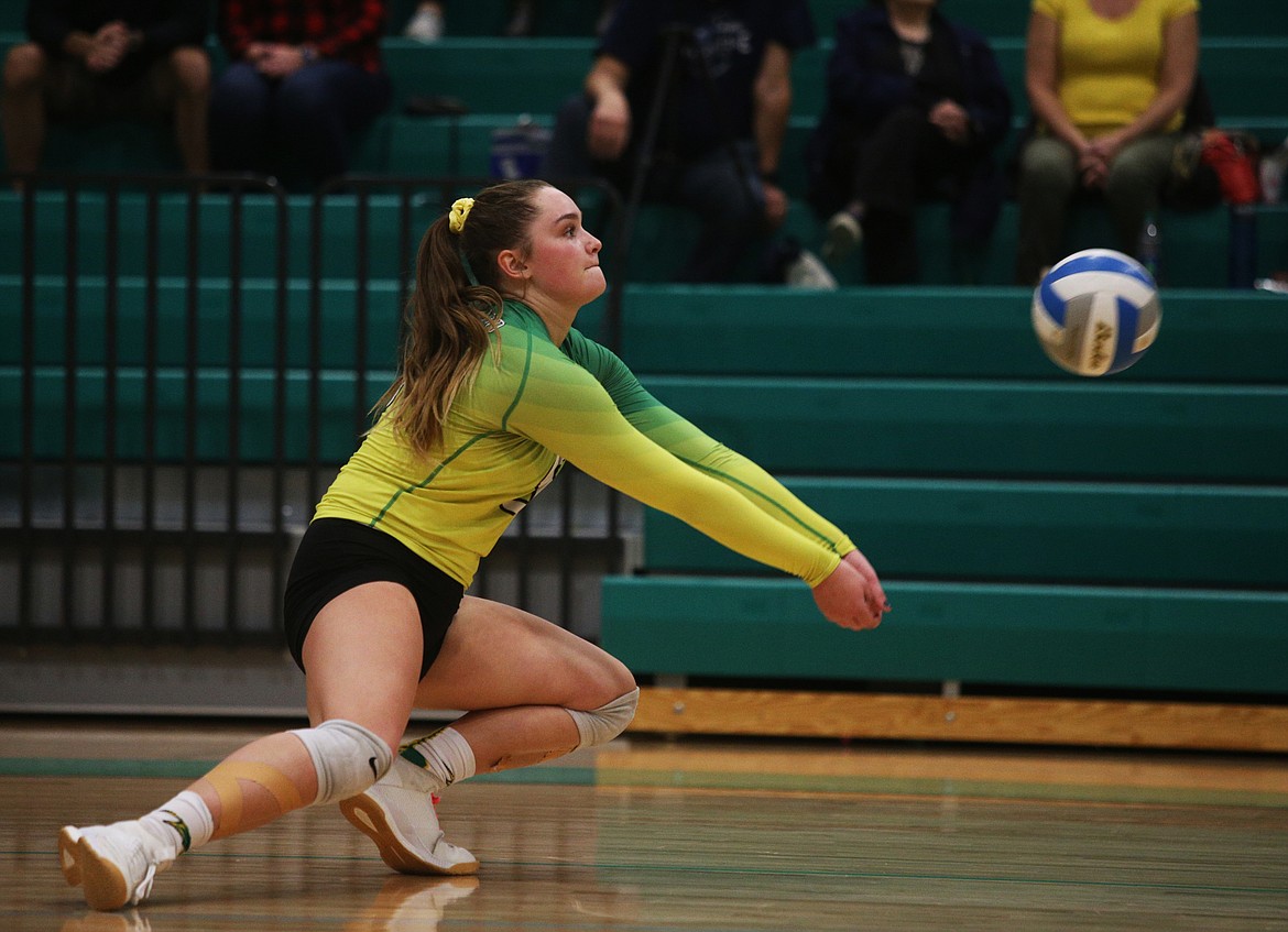 Lakeland High&#146;s Daphne Carroll digs an opponent&#146;s spike in the 4A Region 1 championship match against Moscow. (LOREN BENOIT/Press)