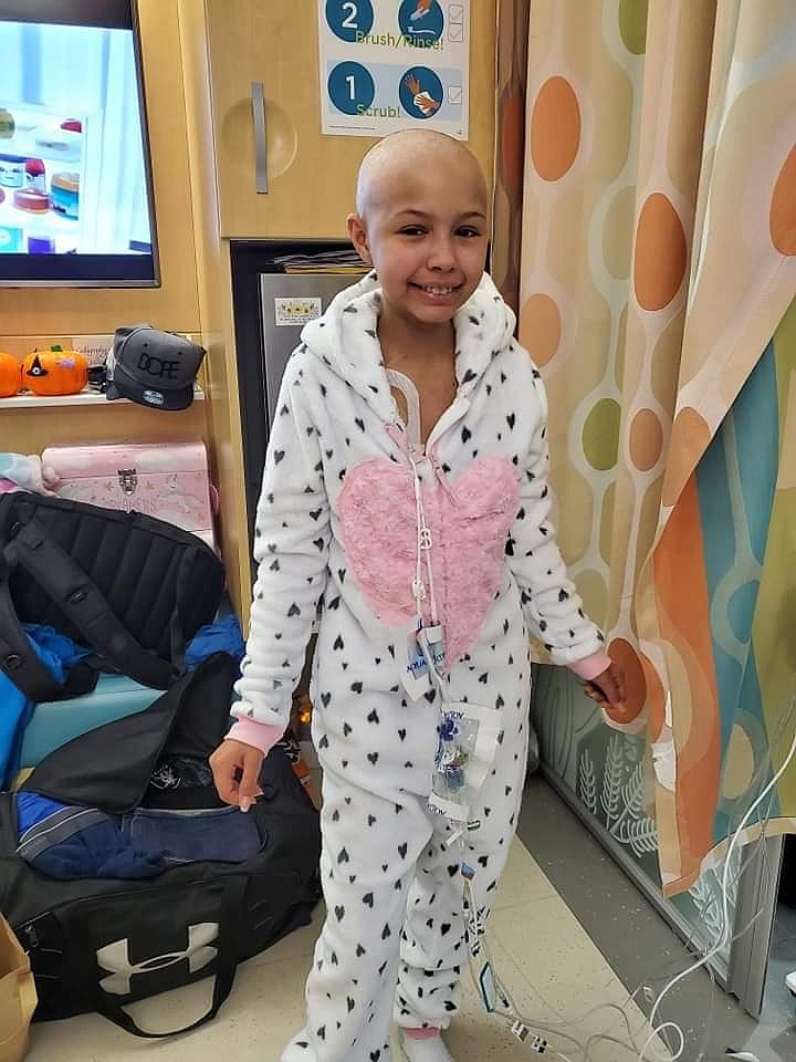 Courtesy photo
Serina Robles, 12, smiles for the camera following her bone marrow transplant and subsequent head-shaving last week. The Fernan fifth-grader is not feeling too hot following the procedure, but her family is by her side as she spends 100 days in Seattle recovering.