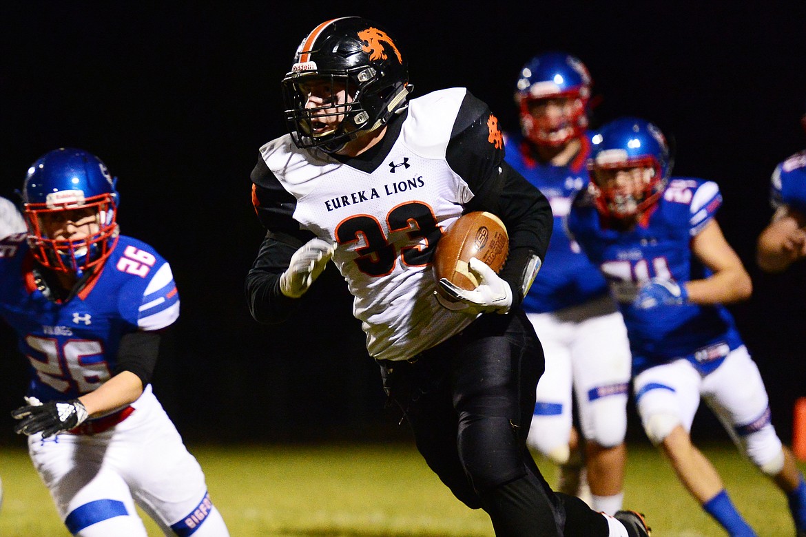 Eureka running back Jake Kindel (33) breaks free on a screen pass in the first quarter against Bigfork at Bigfork High School on Friday. (Casey Kreider/Daily Inter Lake)