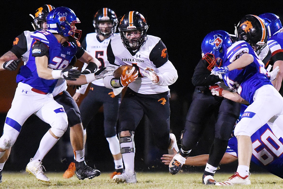 Eureka running back Chet McCully (4) finds running room against Bigfork in the second quarter at Bigfork High School on Friday. (Casey Kreider/Daily Inter Lake)