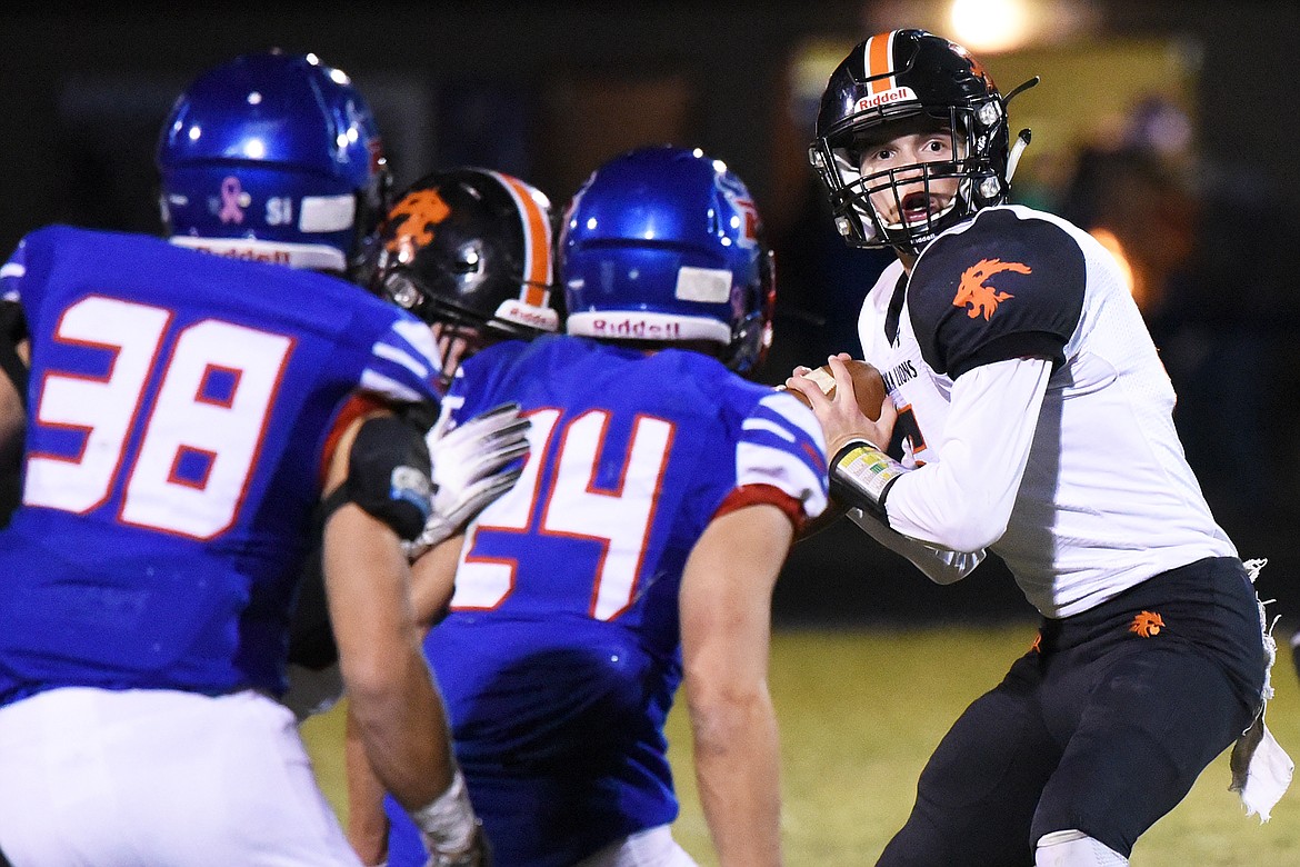 Eureka quarterback Hank Dunn (5) looks to throw in the second quarter against Bigfork at Bigfork High School on Friday. (Casey Kreider/Daily Inter Lake)