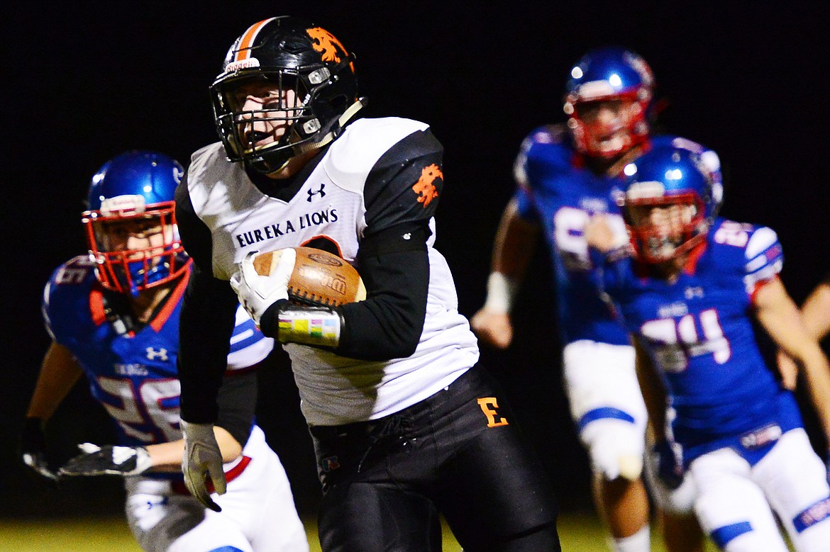 Eureka running back Jake Kindel (33) breaks free on a screen pass in the first quarter against Bigfork at Bigfork High School on Friday. (Casey Kreider/Daily Inter Lake)