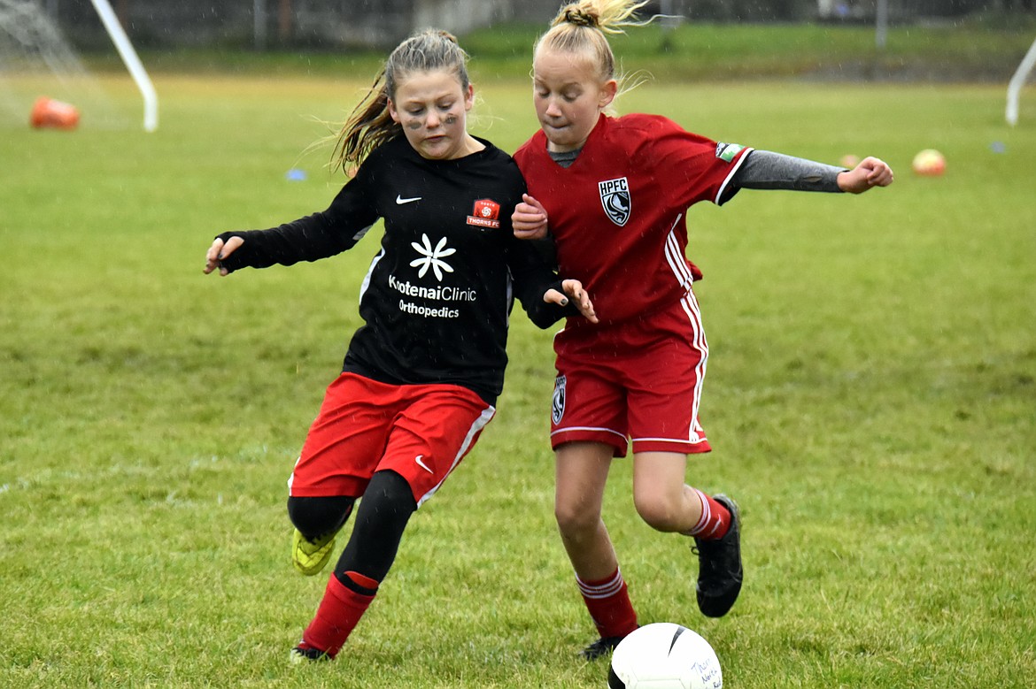 Photo by SUZY ENTZI
The Thorns FC North 08 Girls Red soccer team hosted two games on Saturday. That morning, the Thorns fell to Spokane Premier Vela 6-1. Allison Carrico had the lone goal for the Thorns. That afternoon, the Thorns beat Highline Premier FC Eagles 2-1. Nora Ryan and Isabella Grimmett each had a goal for the Thorns, and Eleanor Moss had an assist. Adysen Robinson was in goal for both Thorns games. Pictured above is Avry Wright, left, of the Thorns.