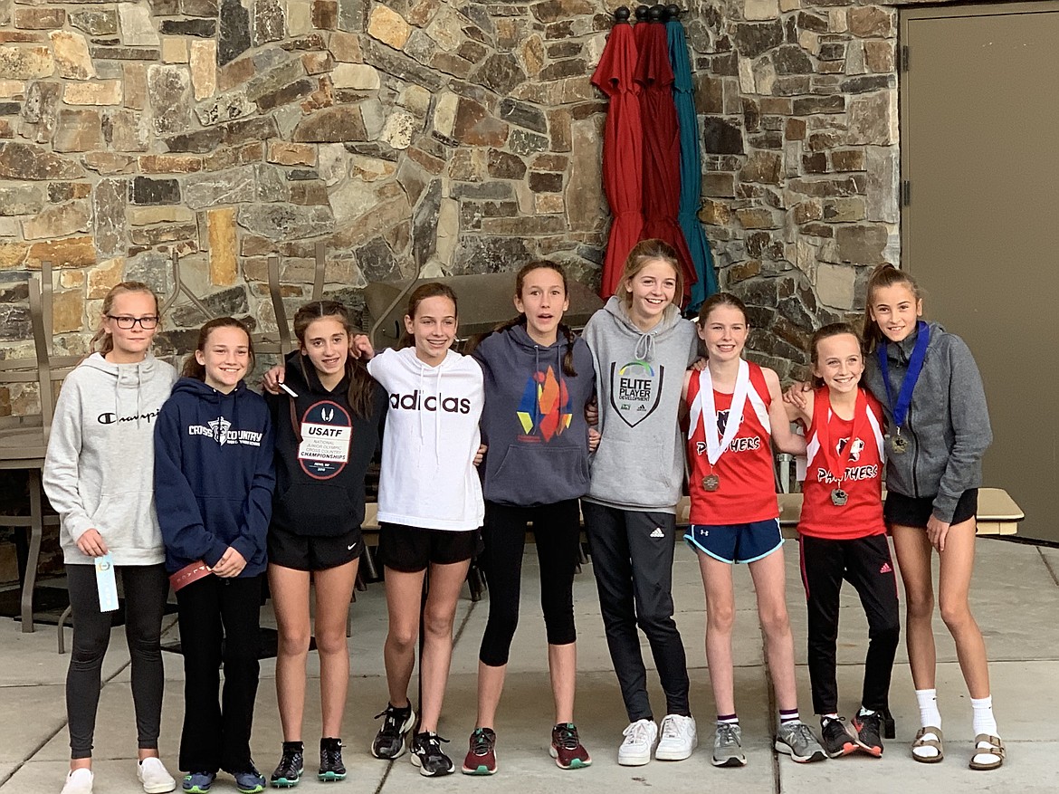 Courtesy photo
The top finishers from the middle school cross country district championships Oct. 16 at Ramsey Park were, from right, 1st, Elliana Rietz (Canfield, 8:30.0); 2nd, Olivia May (Charter, 8:36.0), 3rd, Helen Oyler (Charter, 8:41.0); 4th, Jenny Elliott (Woodland, 8:44.0); 5th, Kaylynn Misner (Post Falls, 8:46.0); 6th, Ann Marie Dance (Charter 8:46.9); 7th, Brooklynn Brennan (Post Falls, 8:47.7 &#151; not pictured); 8th, Zara Munyer (Charter, 8:59.5); 9th, Talia Bonville (River City, 9:11.8); and 10th, Dakota Langevin (Post Falls, 9:14.7).