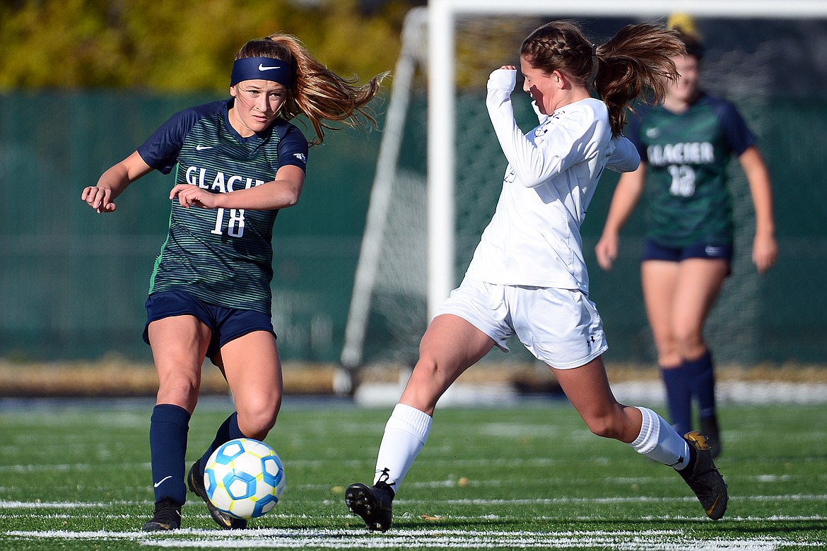 Glacier's Madison Becker (18) pushes the ball upfield against Butte at Legends Stadium on Tuesday. (Casey Kreider/Daily Inter Lake)