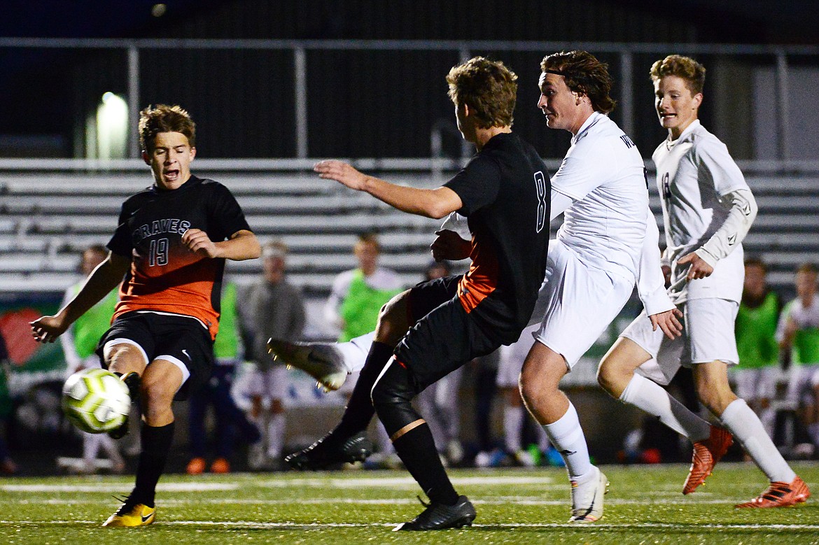Glacier's Braden Nitschelm (4) scores the game-winner in stoppage time to beat Flathead 2-1 at Legends Stadium on Tuesday. (Casey Kreider/Daily Inter Lake)