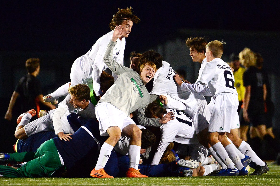 Glacier celebrates after their 2-1 win over Flathead at Legends Stadium on Tuesday. (Casey Kreider/Daily Inter Lake)