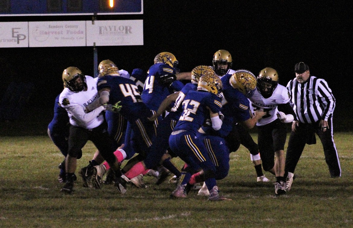 THE BLUEHAWKS worked a play for a couple extra points after a touchdown. (John Dowd/Clark Fork Valley Press)