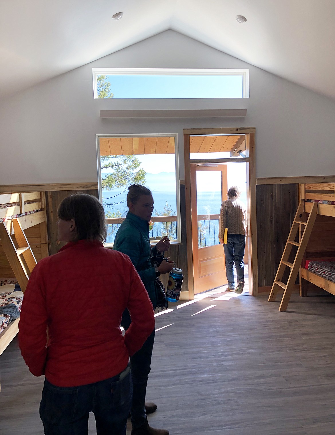 Visitors check out one of the cabins of the new wheelchair accessible Lakeview Cabin Complex at Flathead Lake Bible Camp during a dedication ceremony on Saturday, Oct. 12.