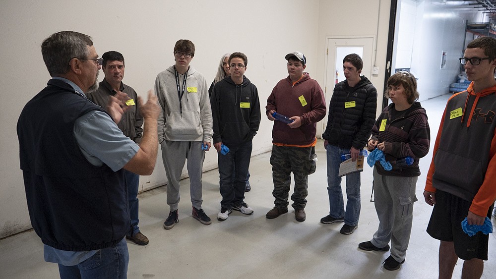 ONE OF the employees at Rocky Mountain Twist, speaks to several of the students from Plains. (Courtesy photo Rocky Mountain Twist)