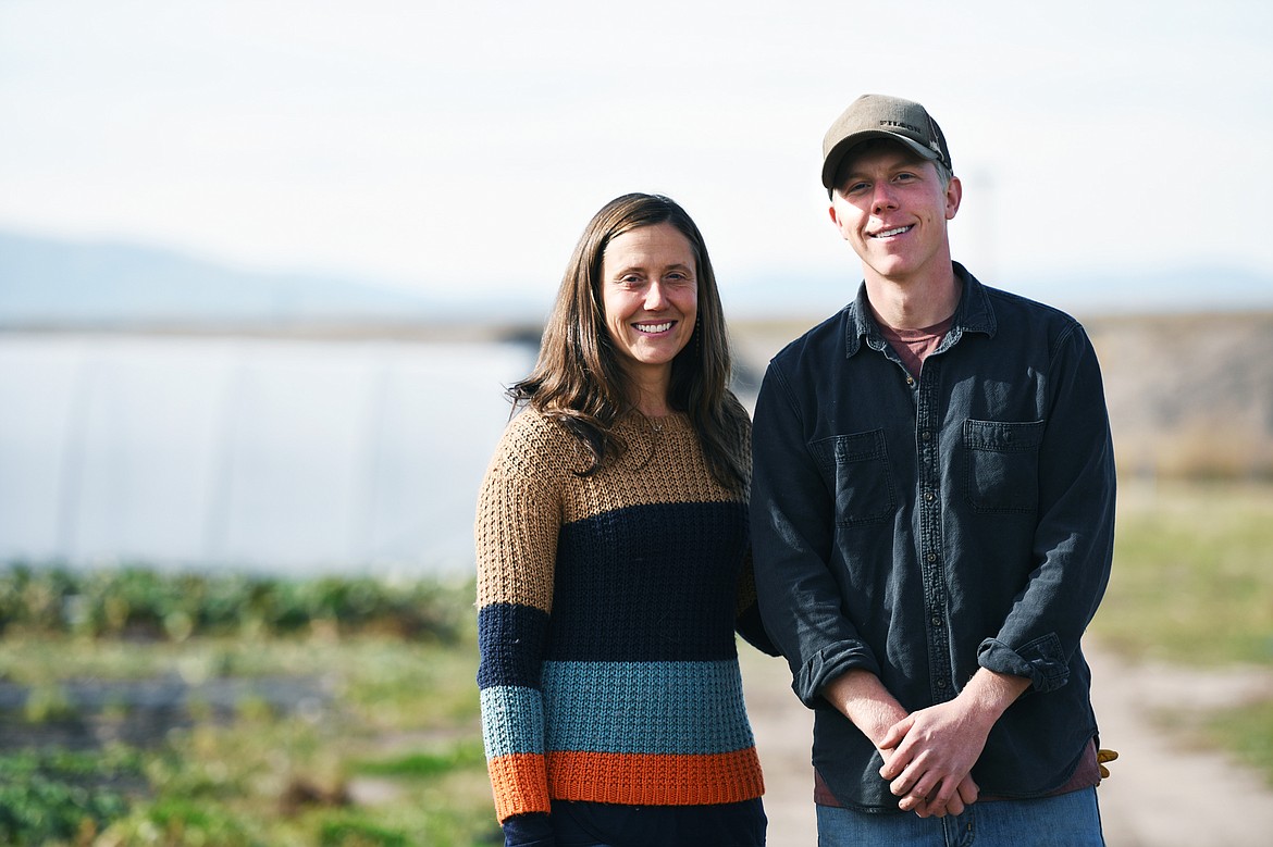 Heather Estrada, Flathead Valley Community College agriculture program director and associate professor, with Dane Regan, farm manager, at the FVCC farm.