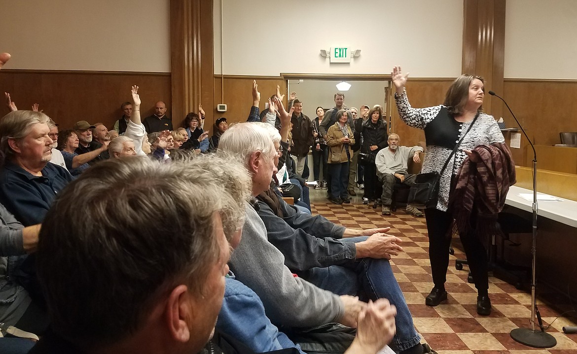 Photo by TONIA BROOKS
Ann Conklin from Paradise Valley asks for a show of hands of people who are against a subdivision proposal for a 4.06-acre parcel on Shamrock Road during an Oct. 17 public hearing on the issue.