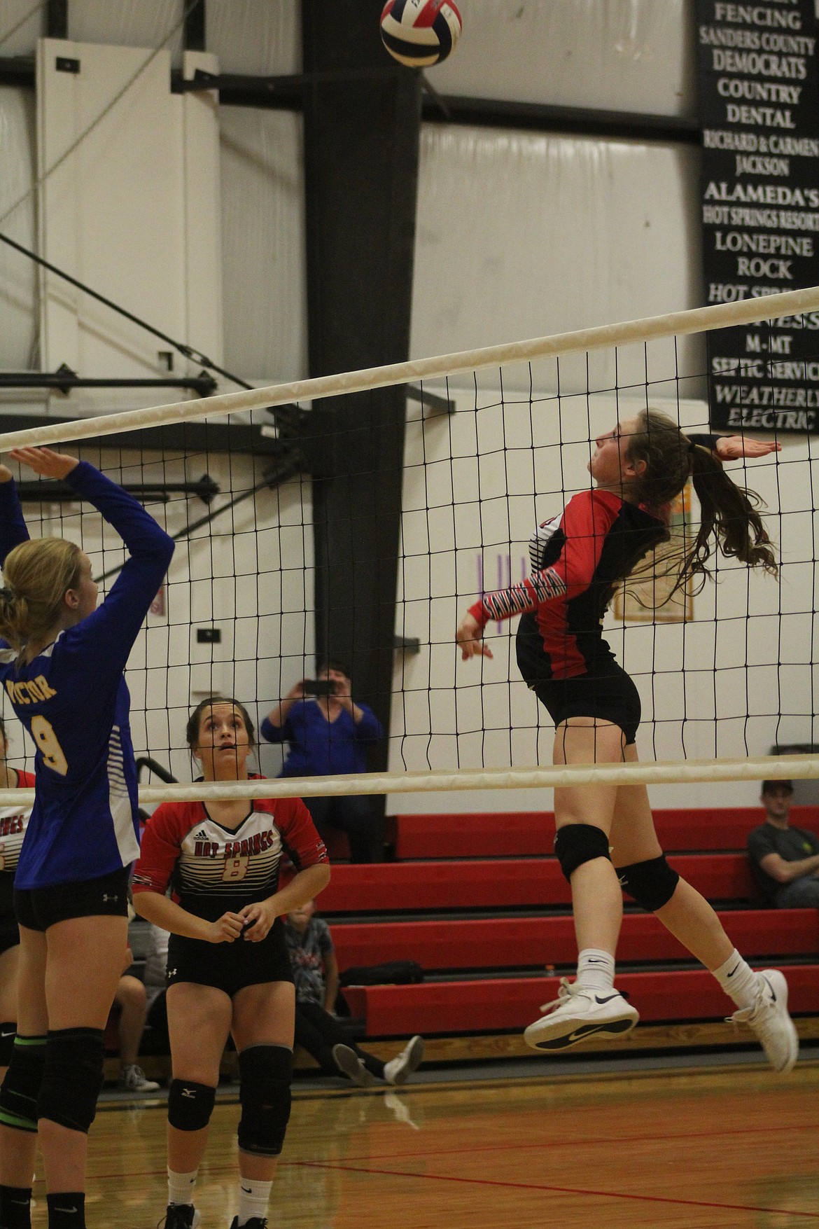 KATELYN CHRISTENSEN delivers a spike. (John Dowd/Clark Fork Valley Press)