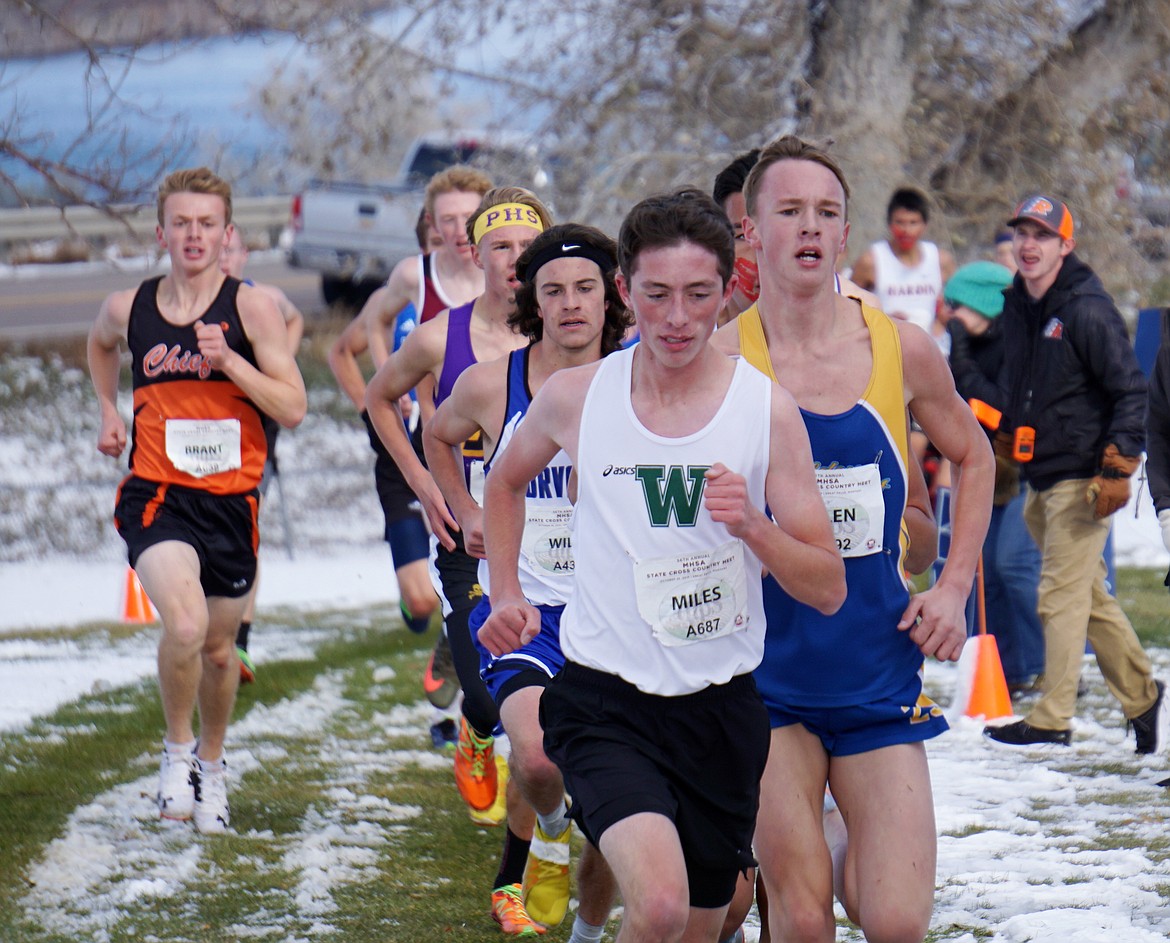 Bulldog Miles Vrentas leads a group of runners at the Class A State Cross Country meet in Great Falls. He finished 19th overall with a time of 17:10.02. (Matt Weller photo)