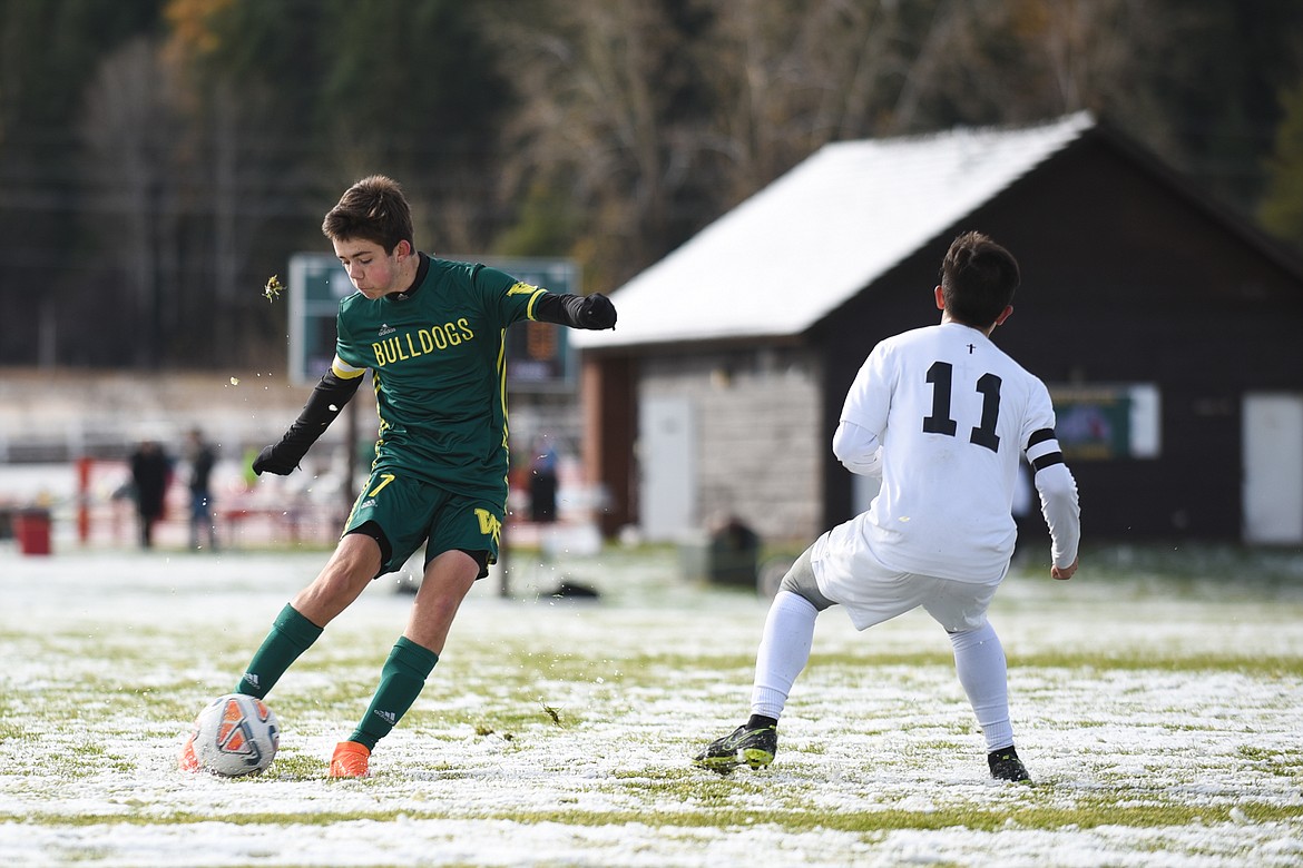 Ian Lacey winds up a kick during the Bulldogs&#146; semifinal win at home on Saturday. (Daniel McKay/Whitefish Pilot)