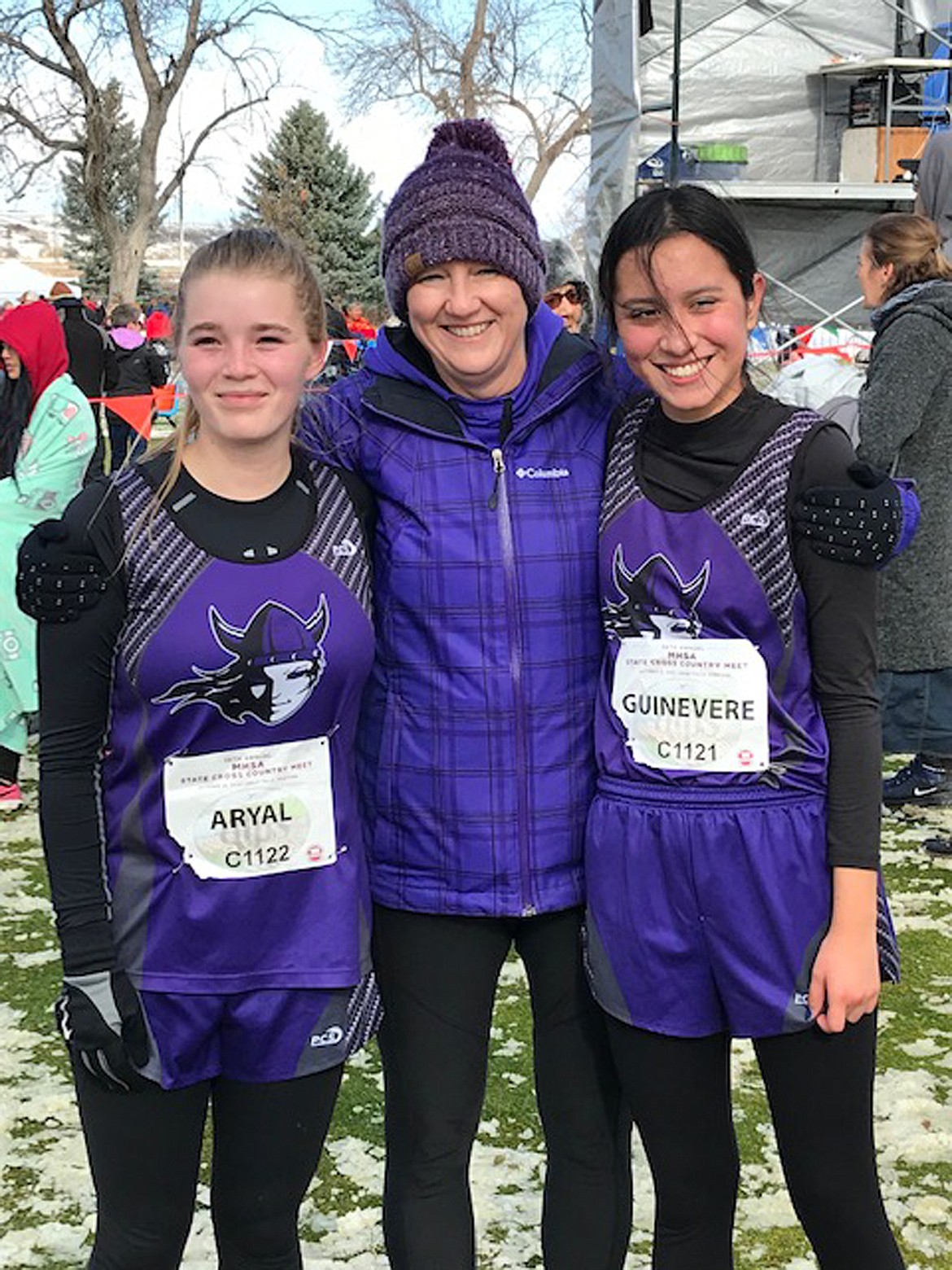 Charlo cross country runners Aryal Love, coach Amy Delaney and Guinevere Contreras pose at the 2019 State C segment of the all classification state cross country meet at Eagle Falls Golf Course in Great Falls. (Photo courtesy of Steve Love)