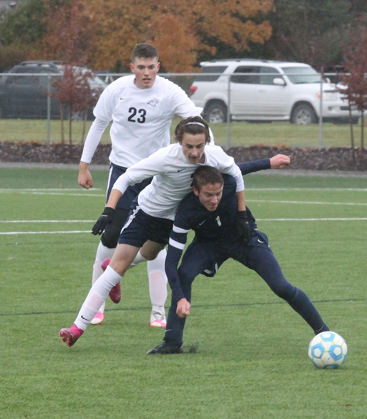 JASON ELLIOTT/Press
Coeur d&#146;Alene Charter junior Ronan Malaghan battles for position with Bonners Ferry forward Ian Beazer during the first half of the 3A District 1-2 boys soccer championship at The Fields at Real Life Ministries in Post Falls on Saturday.