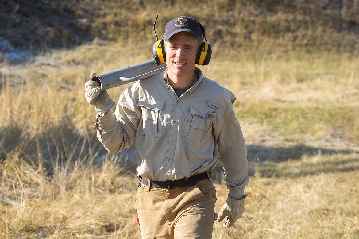 Franz Ingelfinger of Montana Fish, Wildlife and Parks works at Cow Creek as part of a restoration project. (Daniel McKay/Whitefish Pilot)