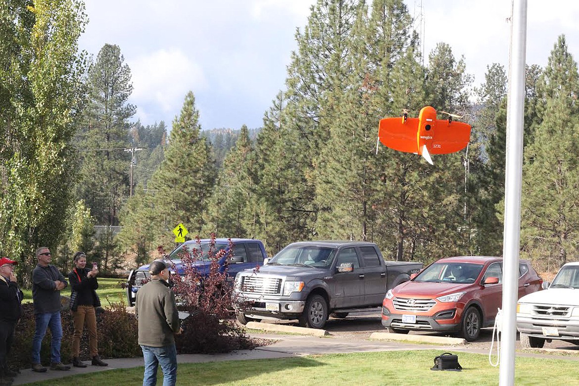 Aaron Fisher, Drone Project manager for Idaho Forest Group, shows how his company uses a drone at its plant. (Chuck Bandel/Mineral Independent)