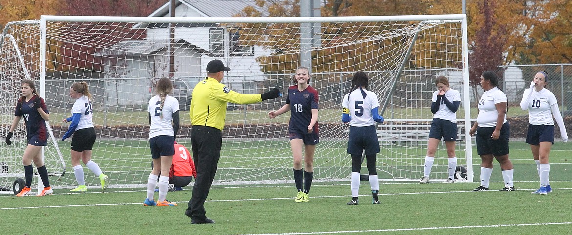 MARK NELKE/Press
Eden Harger (18) of Coeur d'Alene Charter Academy celebrates a goal during Saturday's 3A District 1-2 girls soccer championship game at The Fields at Real Life Ministries in Post Falls.