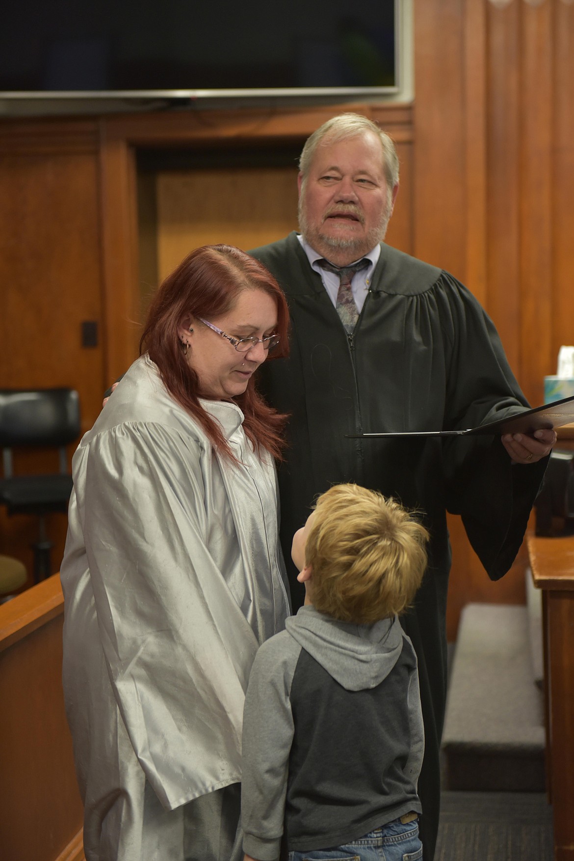 Diane Dalke receives accolades from Judge Manley and from her own family in recognition of her achievement of graduating from Lake County Drug Court into a new successful life. Diane started nursing school recently. (Carolyn Hidy/Lake County Leader)
