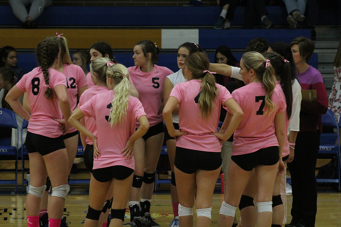 THE LADY Hawks wearing their breast cancer awareness jerseys last Thursday night. (John Dowd/Clark Fork Valley Press)