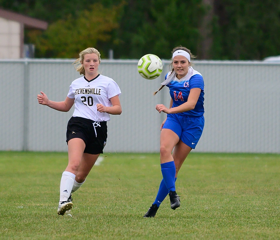 LaKia Hill clears the ball on defense.