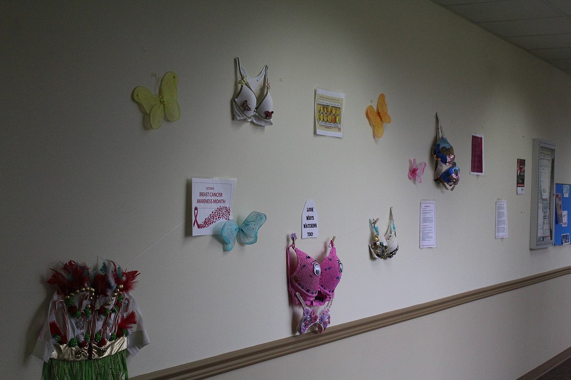 DECORATED BRAS on display in the hallway leading to the radiology department in the Clark Fork Valley Hospital. The bras were decorated by community members in exchange for a donation to one of the donor funds. (John Dowd/Clark Fork Valley Press)