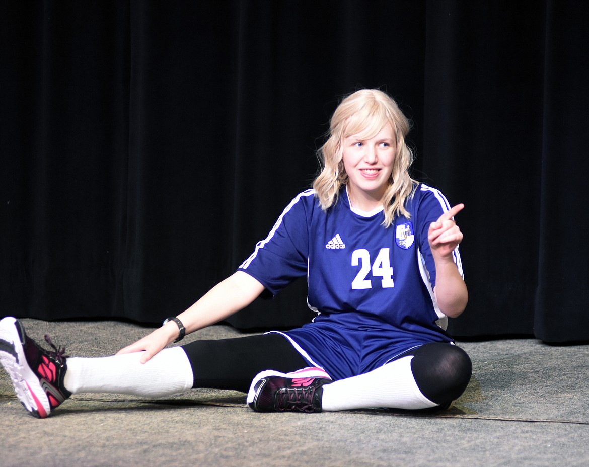 Playing a soccer player, Joanna Hannigan points to one of her teammates in a stretching session during a dress rehearsal last week for &#147;The Wolves&#148; at Whitefish High School. (Heidi Desch/Whitefish Pilot)