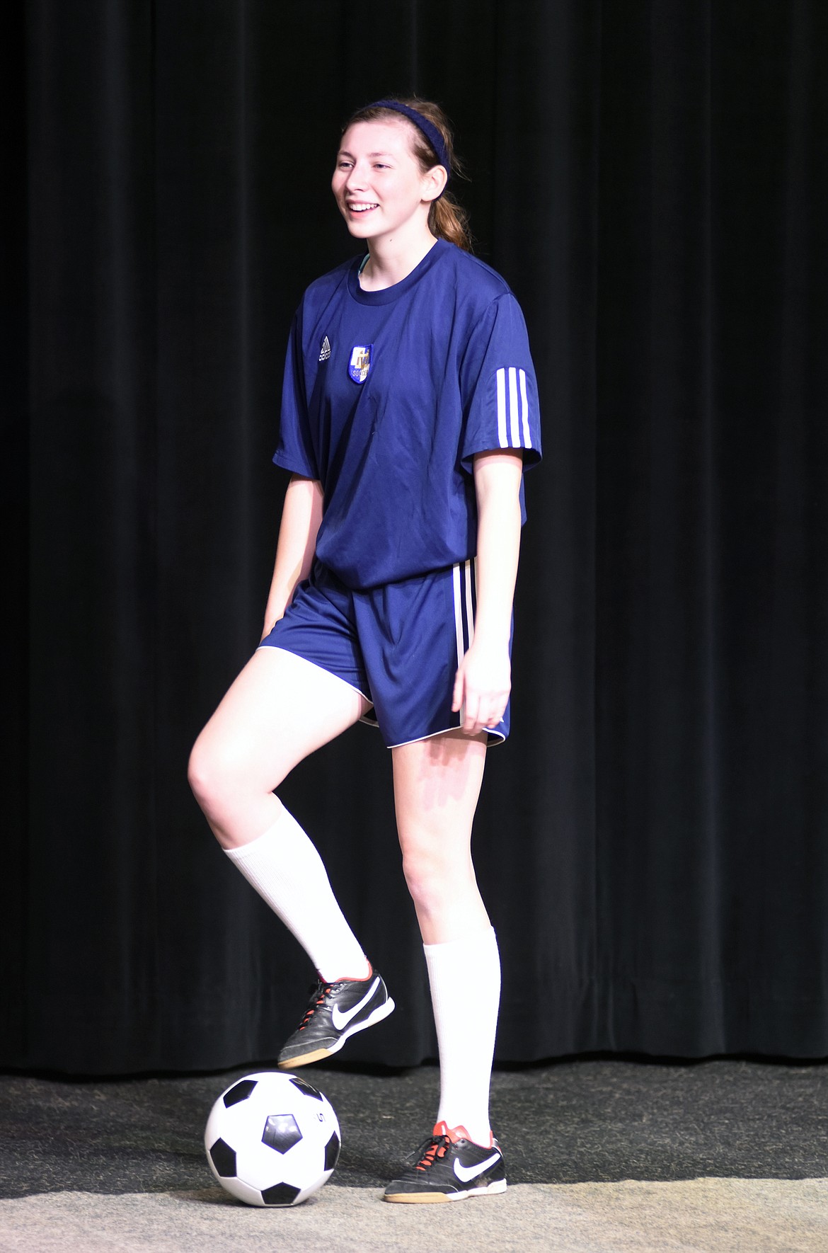 Lauren Matchett handles a soccer ball during a dress rehearsal last week for &#147;The Wolves&#148; at Whitefish High School. (Heidi Desch/Whitefish Pilot)