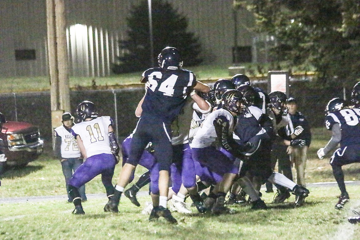 Photo by MANDI BATEMAN
The Badgers battles the visiting Wildcats last Friday.