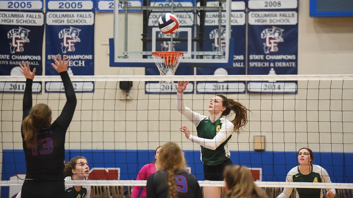 Kaiah Moore sends the ball back against Columbia Falls on Tuesday. (Daniel McKay/Whitefish Pilot)