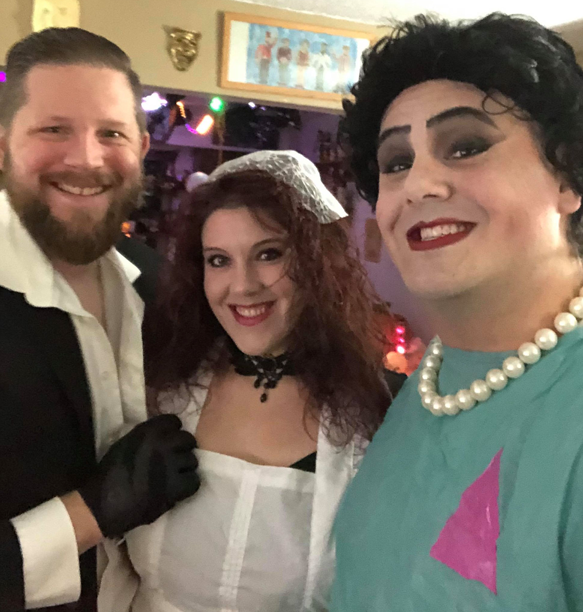 Courtesy photo
Chris and Jona Pease stand with Sean Shelley during the Sixth Street Theatre&#146;s screening of &#147;The Rocky Horror Picture Show.&#148; Chris dressed up as Riff Raff, Jona as Magenta and Shelley as Dr. Frank N. Furter.