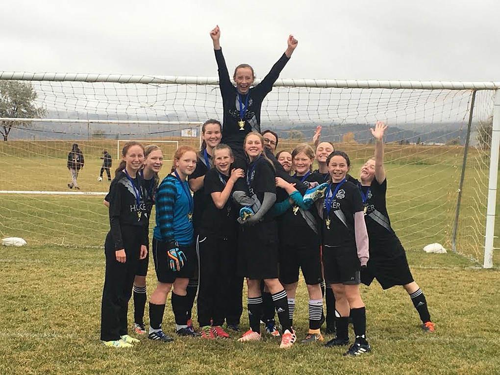 The Wildhorse Youth Soccer Association U18 girls soccer team celebrates its win at the North West Specialty Schools Tournament Saturday. Stillwater Christian School hosted the tournament. Wildhorse won the game on penalty kicks. (Courtesy photo)