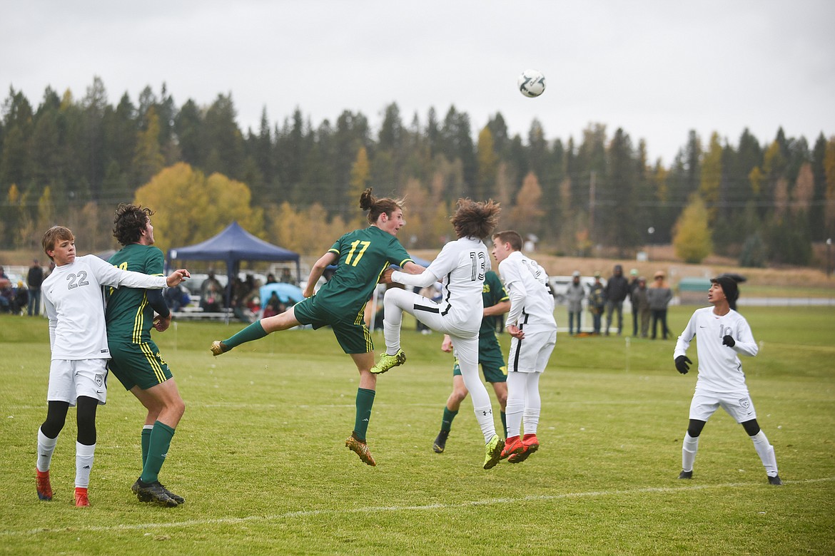 James Thompson hits a header during the Dogs' playoff win over Stevensville. (Daniel McKay/Whitefish Pilot)