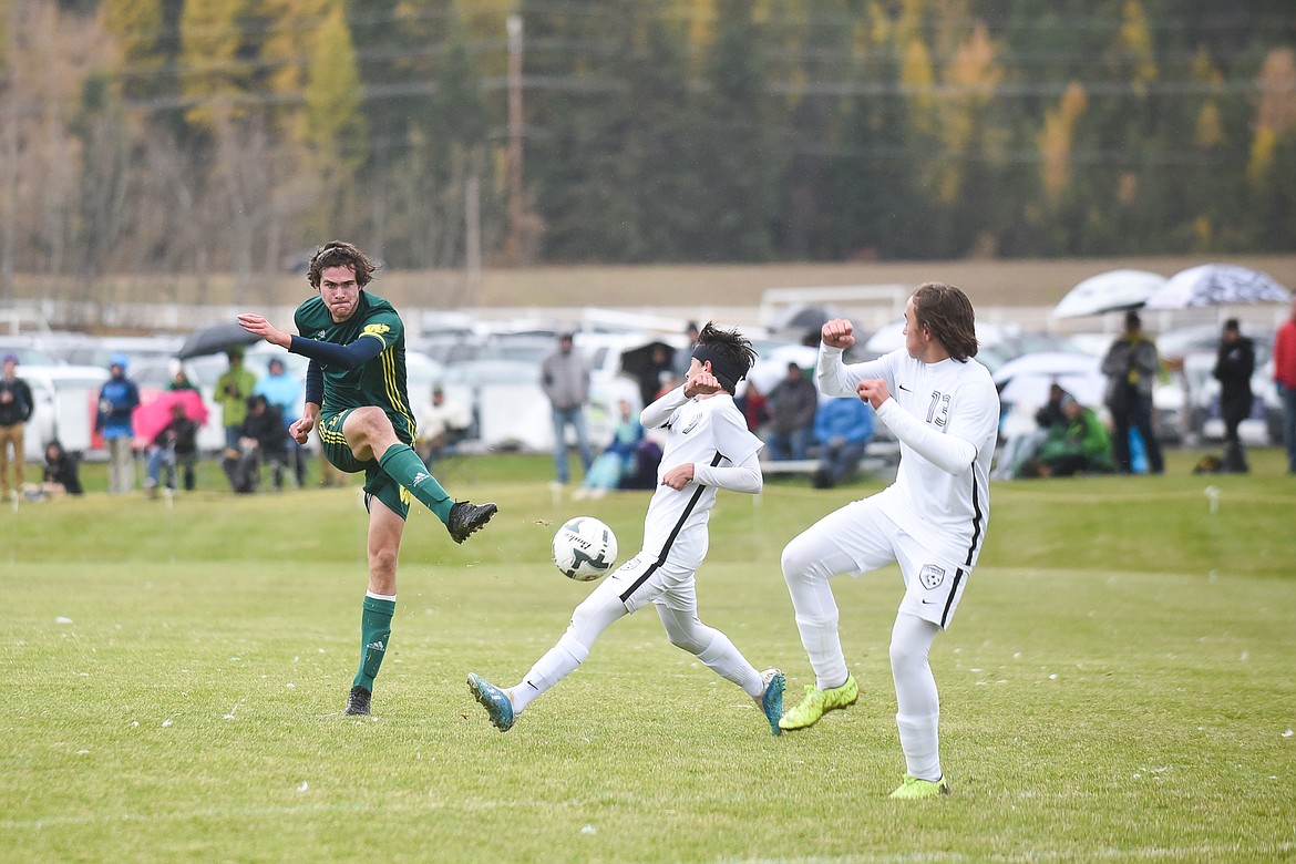 Sam Menicke fires a shot during the Dogs' playoff win over Stevensville. (Daniel McKay/Whitefish Pilot)