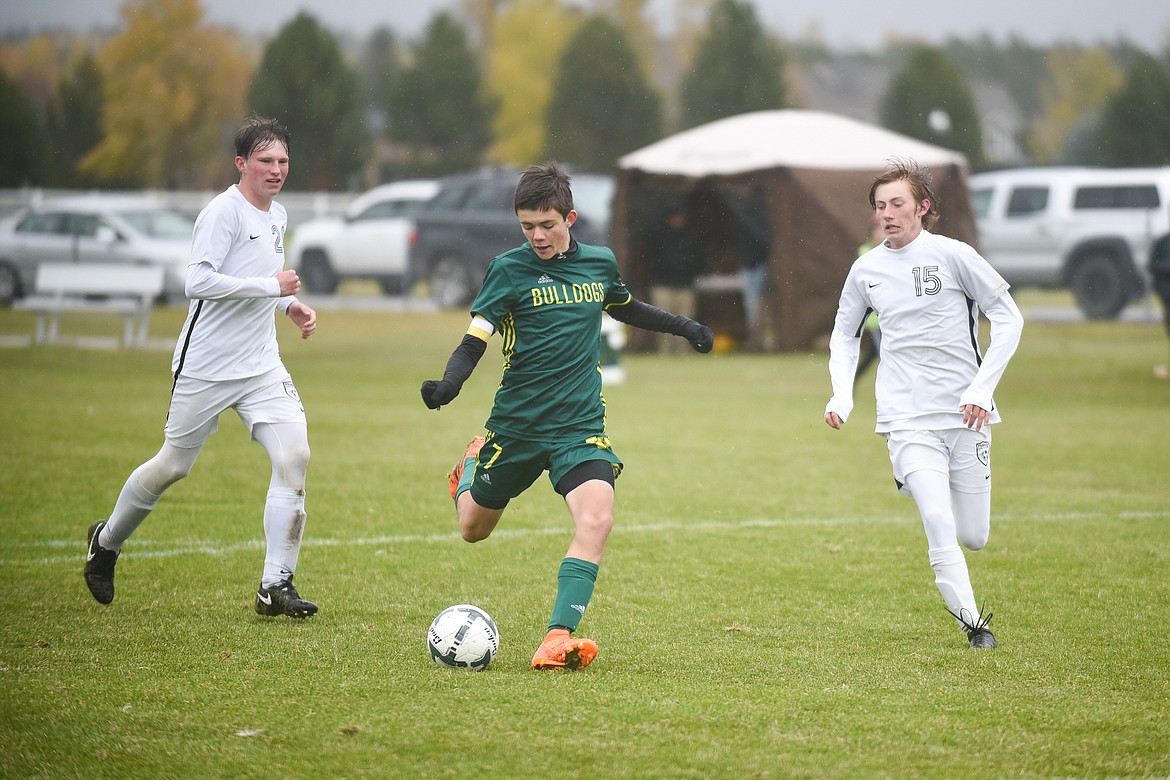 Ian Lacey attacks the goal during the Dogs&#146; playoff win over Stevensville. (Daniel McKay/Whitefish Pilot)