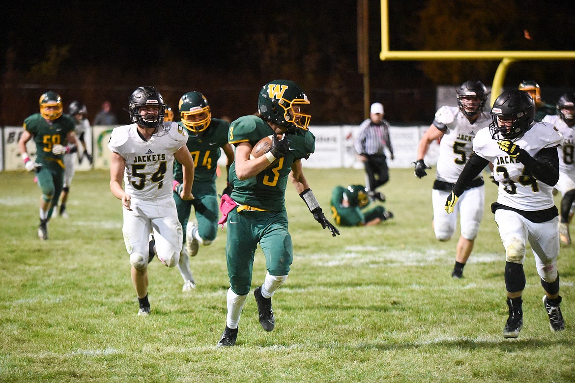 Jack Alton races for his second touchdown of the night during Friday&#146;s win over Stevensville. (Daniel McKay/Whitefish Pilot)