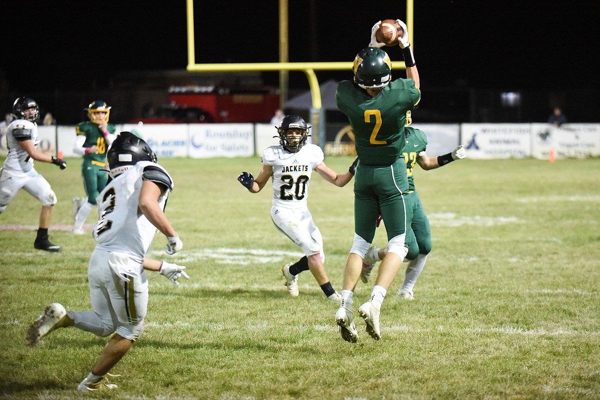 Bodie Smith snags the pass during Friday&#146;s win over Stevensville. (Daniel McKay/Whitefish Pilot)
