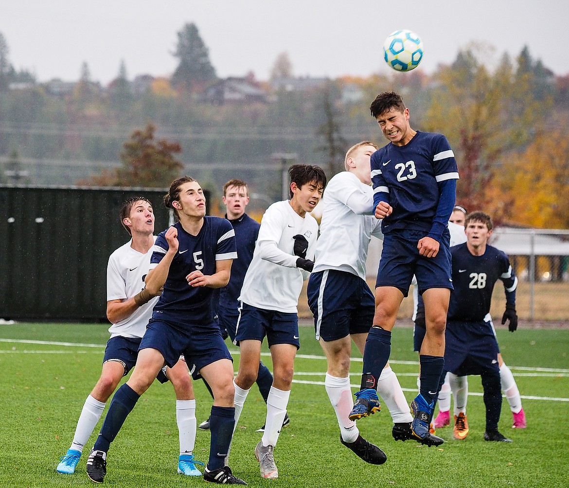 Photo by DOUG BEAZER
Bonners Ferry&#146;s Daniel Walker rises above the crowd for a header during the IML District title game against Coeur d&#146;Alene Charter on Saturday, Oct. 19. The Badgers won 4-1 and will compete in the 3A state tournament, beginning today.