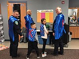 Cops in capes: Othello police surprise kind children during Kindness Week