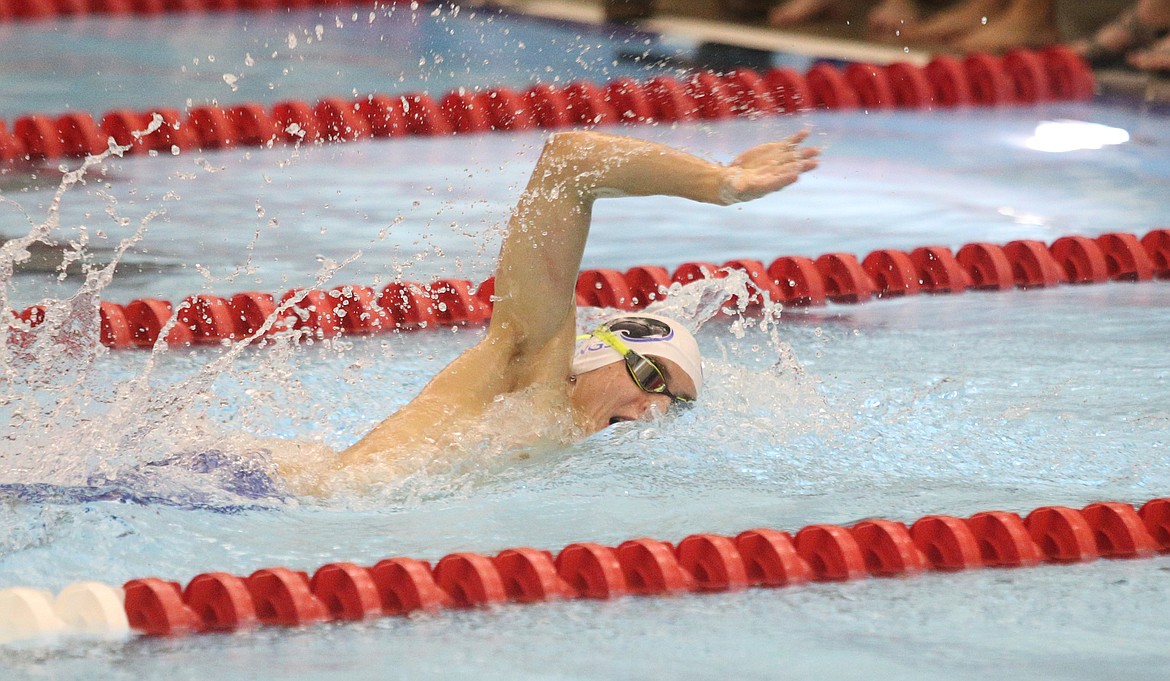 Coeur d&#146;Alene High&#146;s Caleb Markowski competes in the 400 yard freestyle relay during the 5A/4A District 1 Championship swim meet at the Kroc Center. (LOREN BENOIT/Press)